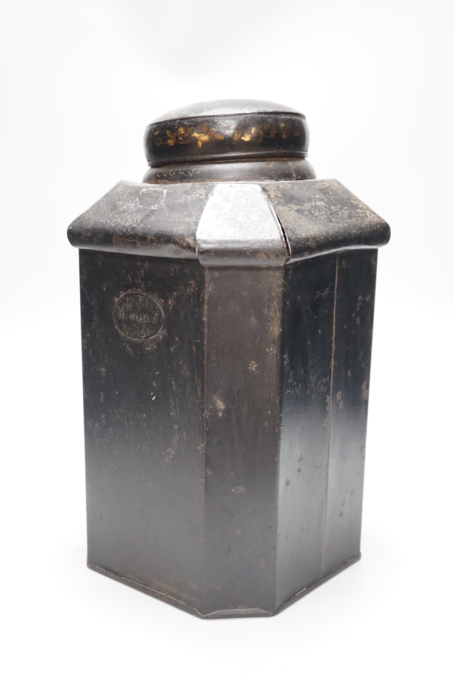 A 19th century toleware octagonal tea canister, J. Newman, Dublin, painted with flowers and Chinese script, 36cm